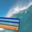 Ciel et Mer ambiance lamp in fused glass, with shades of blue evoking the marine horizon, set on a wooden stand.