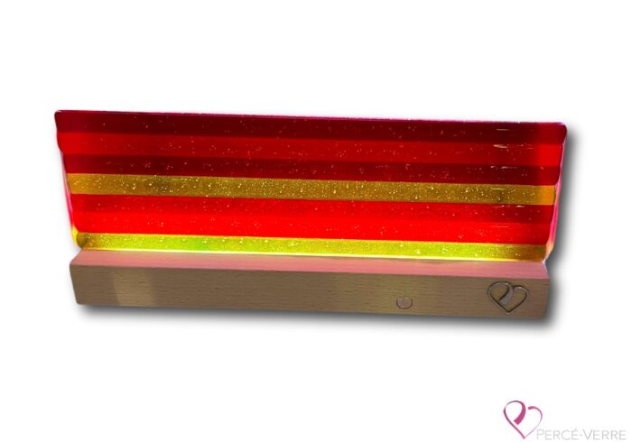 Soleil de Feu lamp in fused glass, an original work by Percé-Verre, providing colorful light, warm ambiance and elegant handcrafted design.
