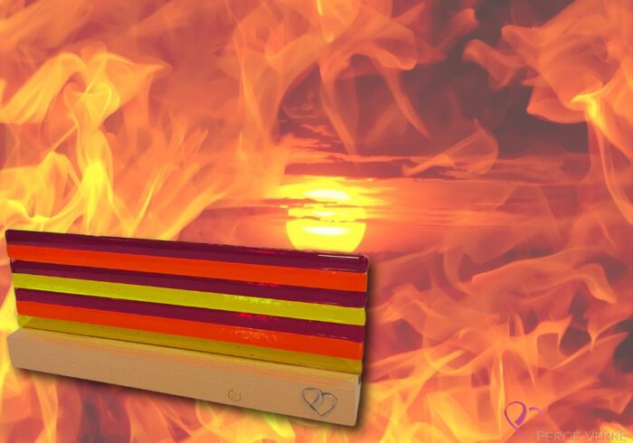 Soleil de Feu lamp in fused glass, with gold, orange and blue gradations reminiscent of a sunset on the beach, hand-crafted by Percé-Verre with hardwood stand.