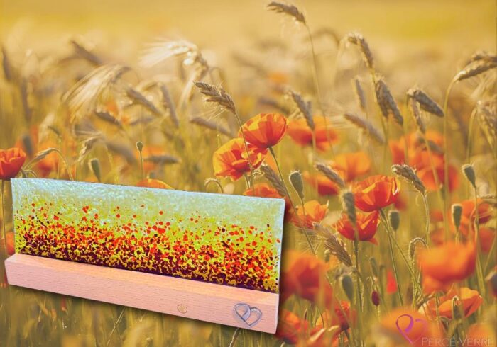 Fleurs des Champs lamp in fused glass with orange and wheat gradations, set on a hardwood base, illuminating a room with warmth and poetic ambience.