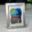 Work in fused glass representing two lovers embracing in a landscape inspired by nature. Unique creation - Amoureux No. 2- signed Stéphanie Béland - Percé-Verre.