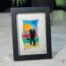 Work in fused glass representing two lovers embracing in a landscape inspired by nature. Unique creation - Amoureux No. 7- signed Stéphanie Béland - Percé-Verre.