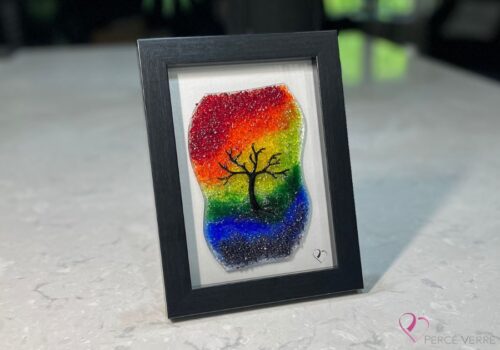 Work in fused glass representing a delicately carved tree, integrated into a colored or abstract background. Arbre No. 2 - Created by Stéphanie Béland - Percé-Verre.