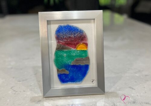 Éclats marins No. 1 - Work in fused glass depicting a vibrantly colored landscape of sea, mountains and sunset.