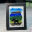 Work in fused glass depicting a moose in a natural Quebec landscape, unique creation Orignal No. 3, signed Stéphanie Béland - Percé-Verre.