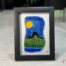 Fused glass work depicting the Château Frontenac as seen from Lévis, framed in 5 x 7 format. Collection Québec en couleurs, Percé-Verre.