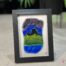 Fused glass work depicting the Château Frontenac as seen from Lévis, framed in 5 x 7 format. Collection Québec en couleurs, Percé-Verre.