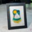 Voilier No. 2 Fused glass work depicting a sailboat on the sea, framed 5 x 7. Cap sur les rêves collection, signed Percé-Verre.