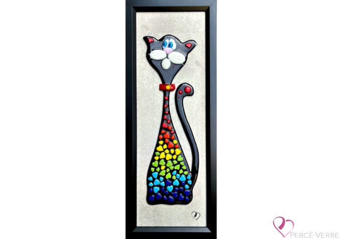 Max, a thoughtful and cunning cat, is represented in fused glass in an original Percé-Verre work by Stéphanie Béland. His expressive colors and calculating gaze perfectly capture his keen intelligence and ability to orchestrate ingenious plans while staying out of harm's way.
