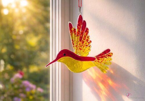 Colibri capteur de soleil en verre fusionné aux couleurs chaudes – fait au Québec